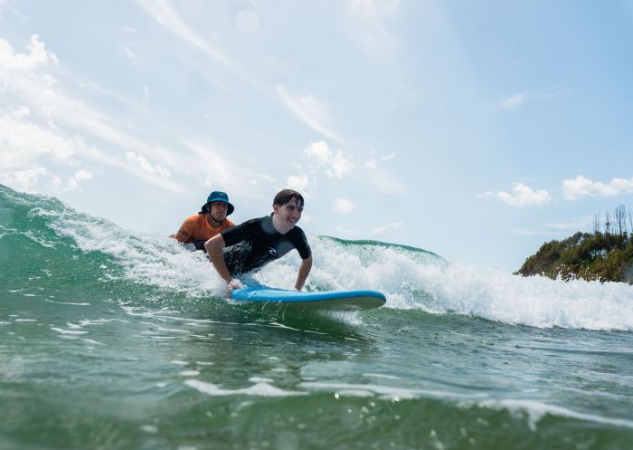 Two men learninig to surf, Solitary Islands Surf School, Woolgoolga