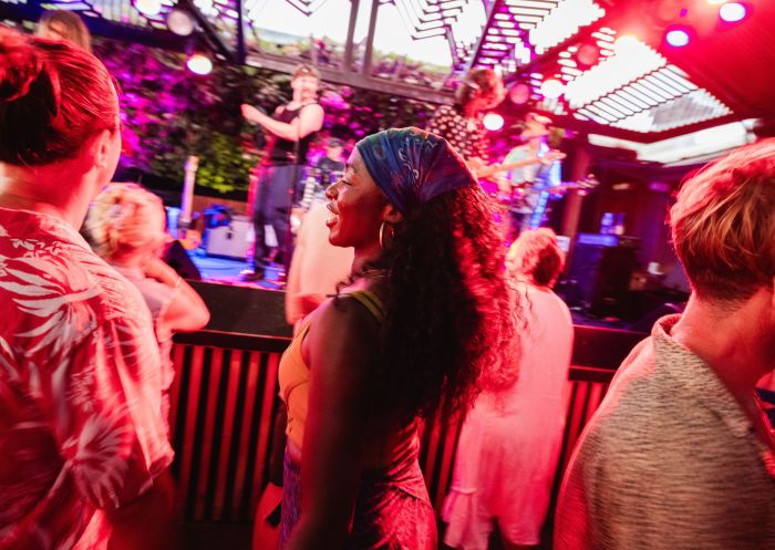 Patrons listening to live music, Beach Hotel, Byron Bay