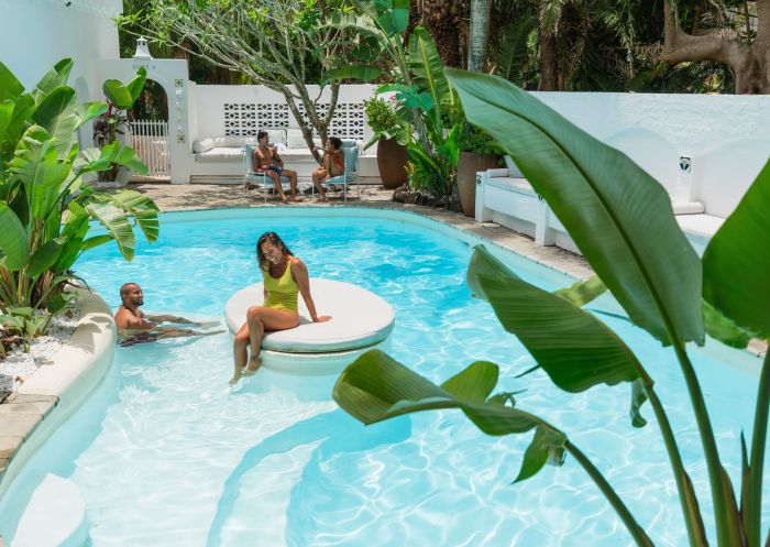 Couple in pool, Raes on Wategos, Byron Bay