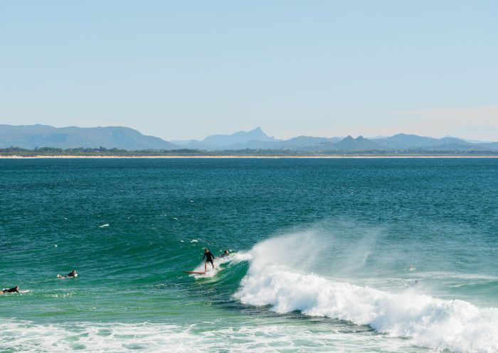 Surfer catching a wave, The Wreck, Byron Bay