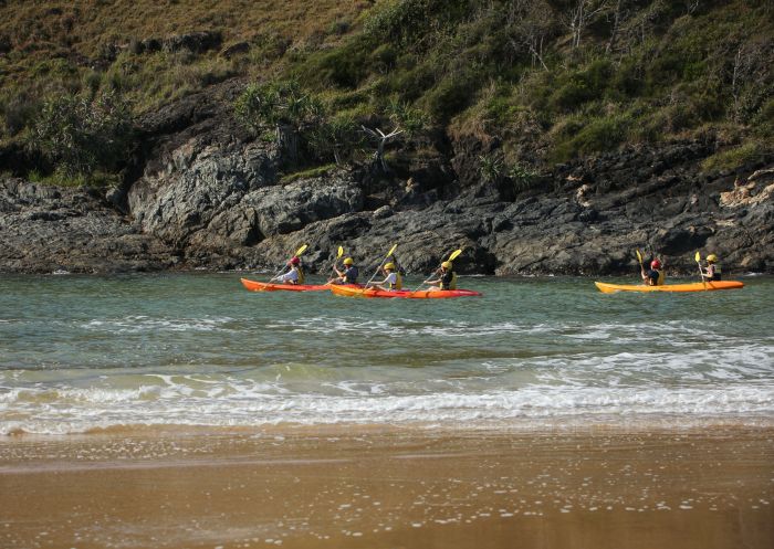 Kayak on the beach with rocks, C-Change Adventures, Coffs Harbour