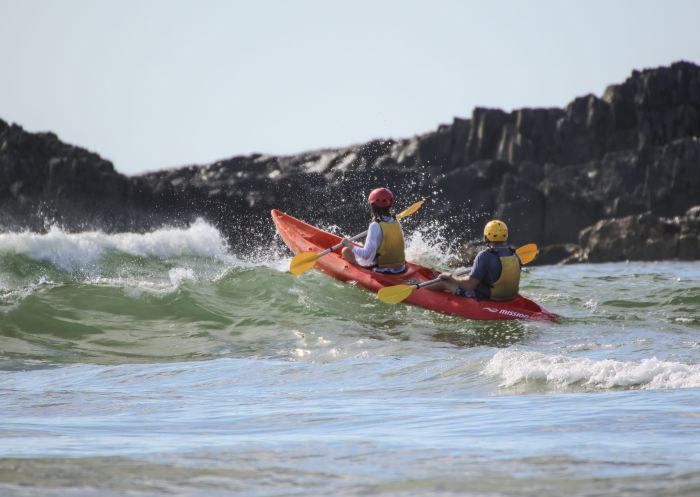 Friends kayaking in ocean, C-Change Adventures, Coffs Harbour