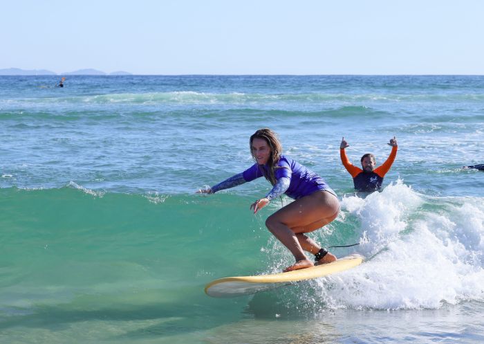 Person learning to surf, Soul Surf School, Byron Bay
