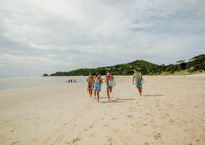 Young people enjoying a day out, Clarkes Beach, Byron Bay