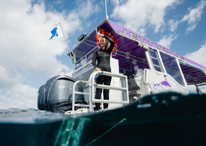 Woman on the boat to start diving, Jetty Dive Centre, Coffs Harbour
