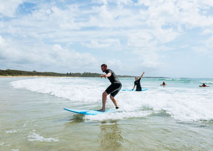 Family surfing on small waves, Solitary Islands Surf School, Woolgoolga