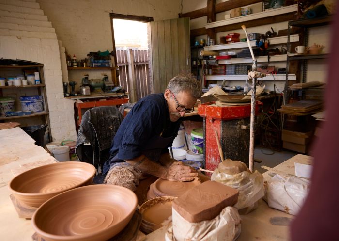 Local artist and potter Paul Bruce throws one-of-a-kind pieces in his pottery studio, Berrima Village Pottery, Berrima