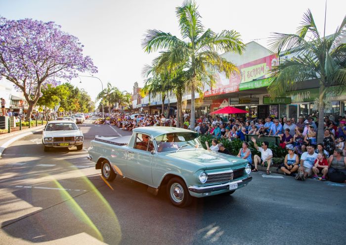 Crowds lining the streets to watch vintage cars partaking in the Float Parade, Grafton Jacaranda Festival 2018, Northern Rivers