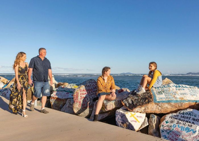 People standing on rocks, V-Wall Outdoor Gallery, Nambucca Heads - - Credit: Rob Cleary | Seen Australia