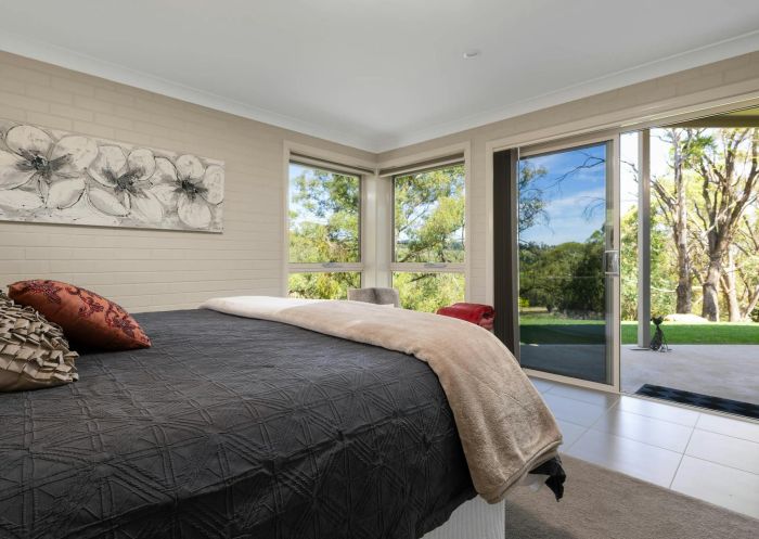 Luxurious bedroom with garden views at Natures Haven Villa in Lakeview Luxury Retreat, Canobolas - Credit: Lakeview Luxury Retreat