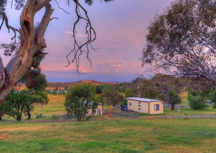 Campsites at sunset, Buckenderra Holiday Village, Buckenderra - Credit: Buckenderra Holiday Village