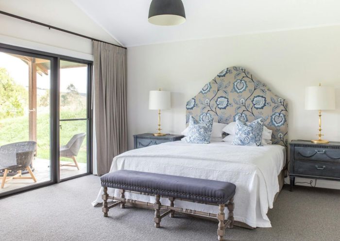 A welcoming bedroom with a king size bed in May Gibbs Cottage at Bendooley Estate, Berrima - Credit: Bendooley Estate