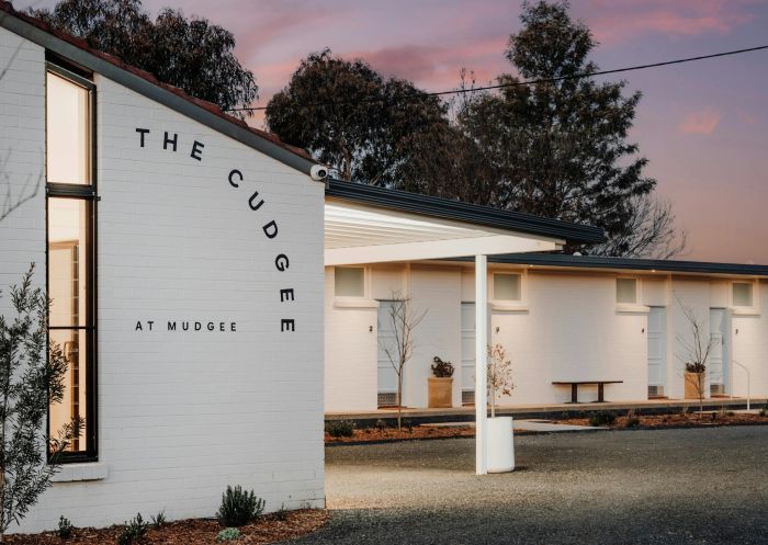 White painted brick motel with logo on wall at The Cudgee at Mudgee - Credit: The Cudgee at Mudgee