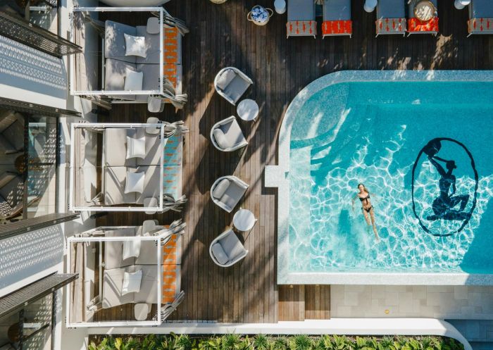 Aerial view of woman in pool, Basq House, Byron Bay - Credit: Basq House