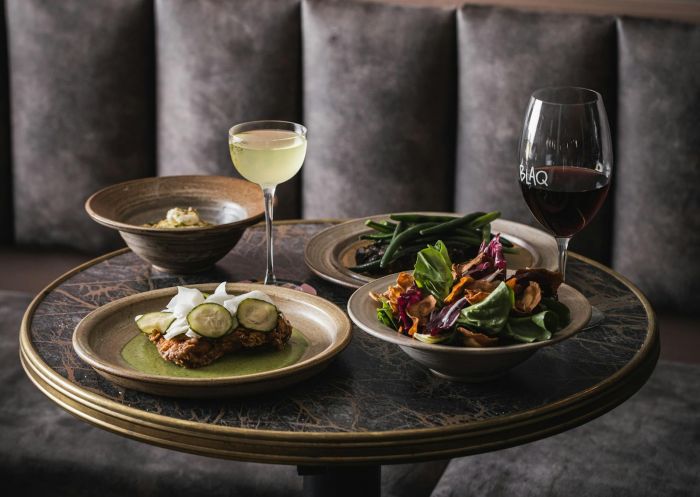Blaq meal with wine on a table at Blaq Restaurant and Bar, Blackheath - Credit: Blaq Restaurant and Bar