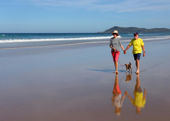 Couple walking with dog, Diamond Waters Caravan Park, Dunbogan - Credit: Jeremy Rodgers