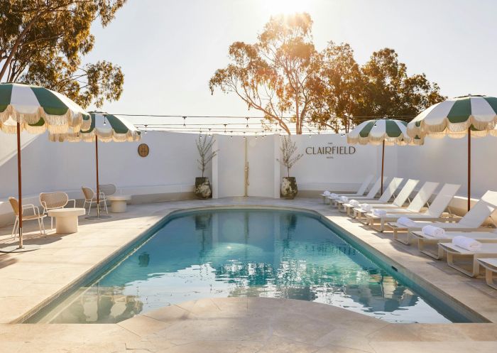 Enclosed hotel pool with daybeds at The Clairfield Hotel, Mudgee - Credit: Alan Jensen | The Clairfield Hotel