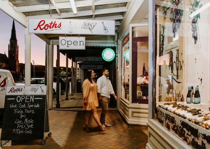 Couple enter Roth's Wine Bar from street at sunset in Mudgee - Credit: Amber Hooper | Mudgee Region