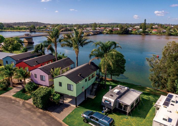 Powered sites by the river at Moruya Holiday Park, Moruya - Credit: AZZ Pty Ltd