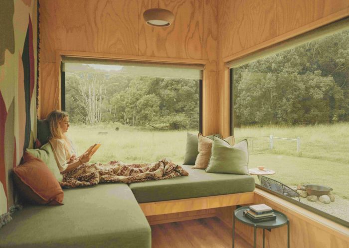 Custom daybed at a luxury off-grid tiny home, Butterfly Lane, Mullumbimby - Credit: Butterfly Lane