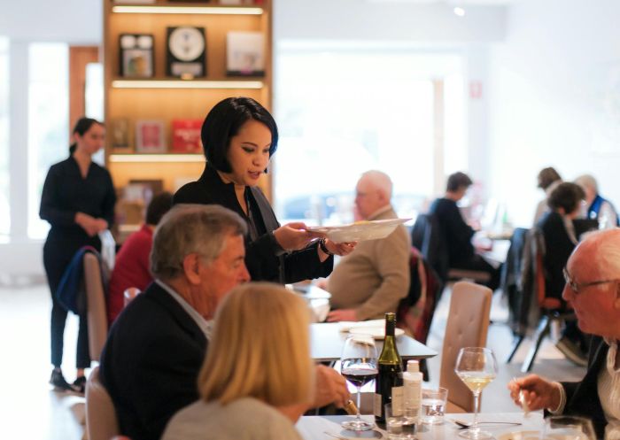 Waiter serving food to diners , Paste Australia,  Mittagong - Credit: Paste Australia