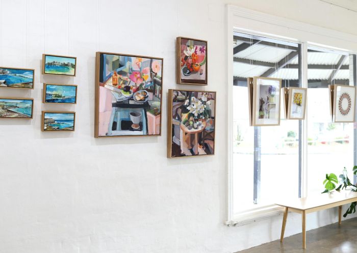 Paintings and other artworks arranged on a wall at The Corner Store Gallery, Orange - Credit: The Corner Store Gallery, Orange NSW