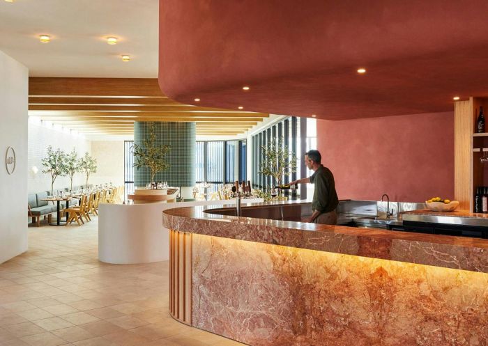 Beautiful marble bar with bartender preparing a drink at Gigi's Restaurant, Mudgee - Credit: Alan Jensen