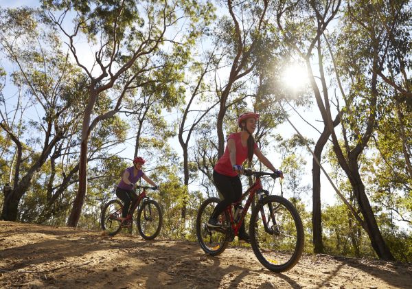 Mother and daughter enjoying a day of mountain biking in the Blue Mountains National Park