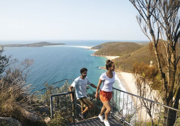 Couple enjoying the coastal views along Tomaree Head Summit Walk, Port Stephens