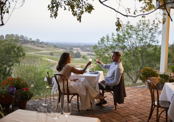 Couple enjoying food and drink at Bistro Molines in Mount View, Hunter Valley