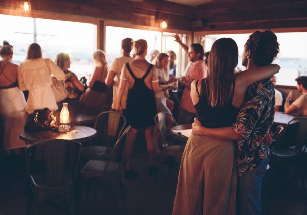 People enjoying drinks and views at The Bolt Hole Bar, Byron Bay 
