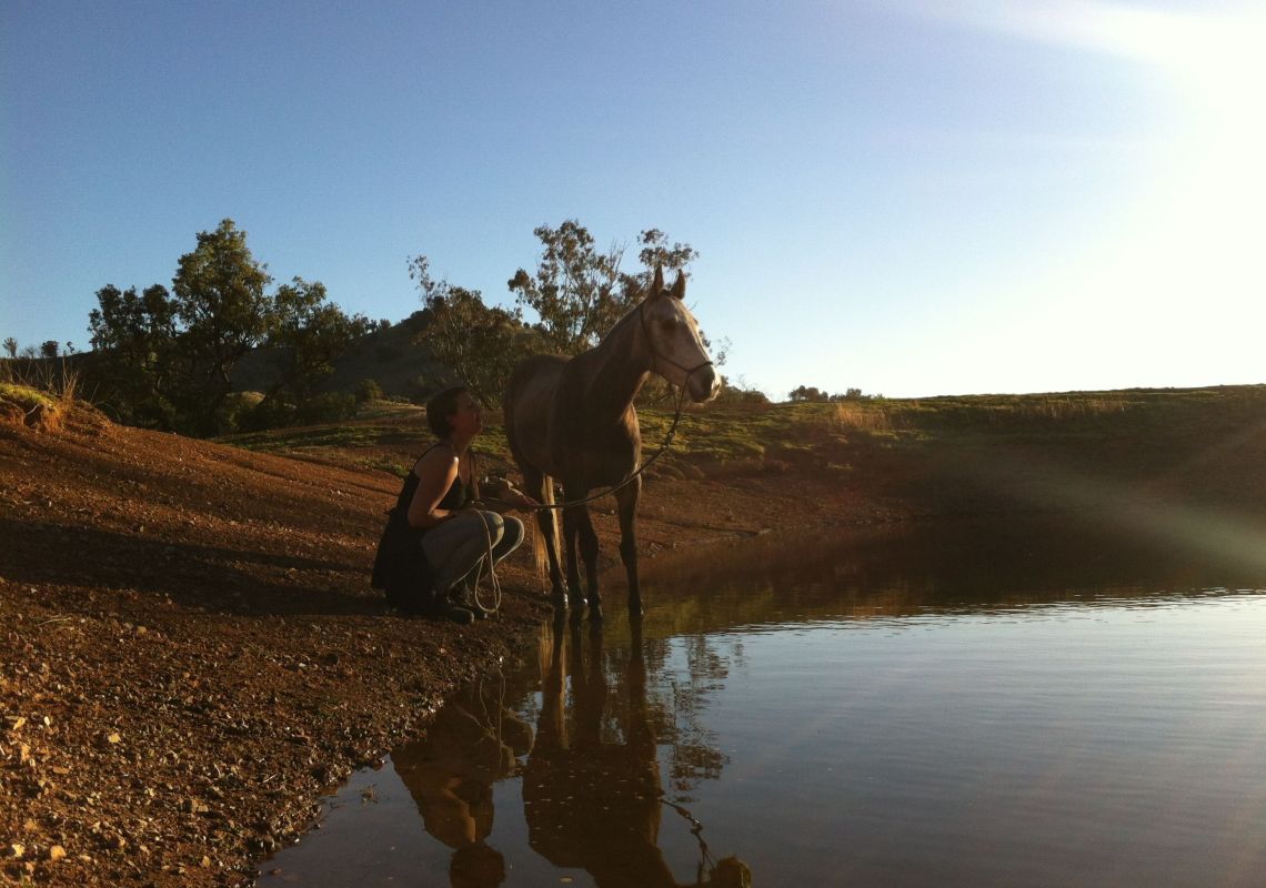 A woman watering her horse, Leconfield 5 Day Jackaroo and Jillaroo School