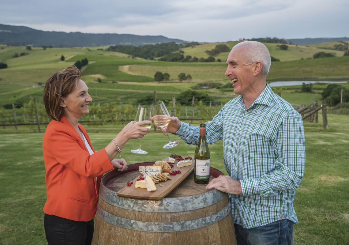 Couple enjoying food and drink at Crooked River Wines, Gerringong