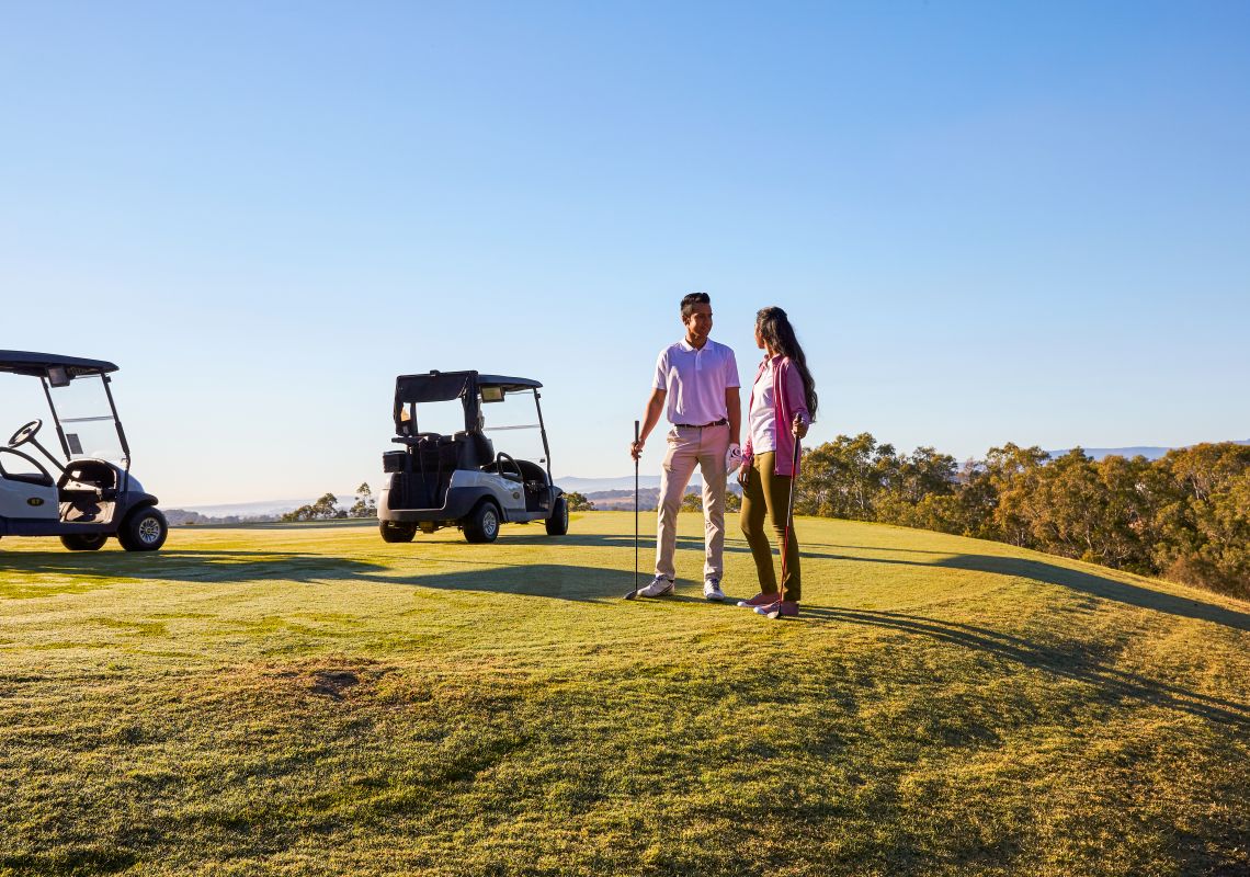 couple on the Cyprus Lakes golf course - Hunter Valley