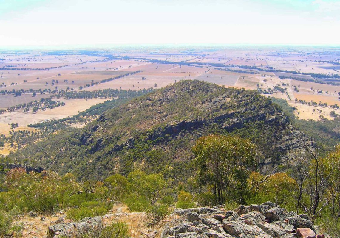  Scenic view of The Rock Nature Reserve and farmland, Lockhart, NSW