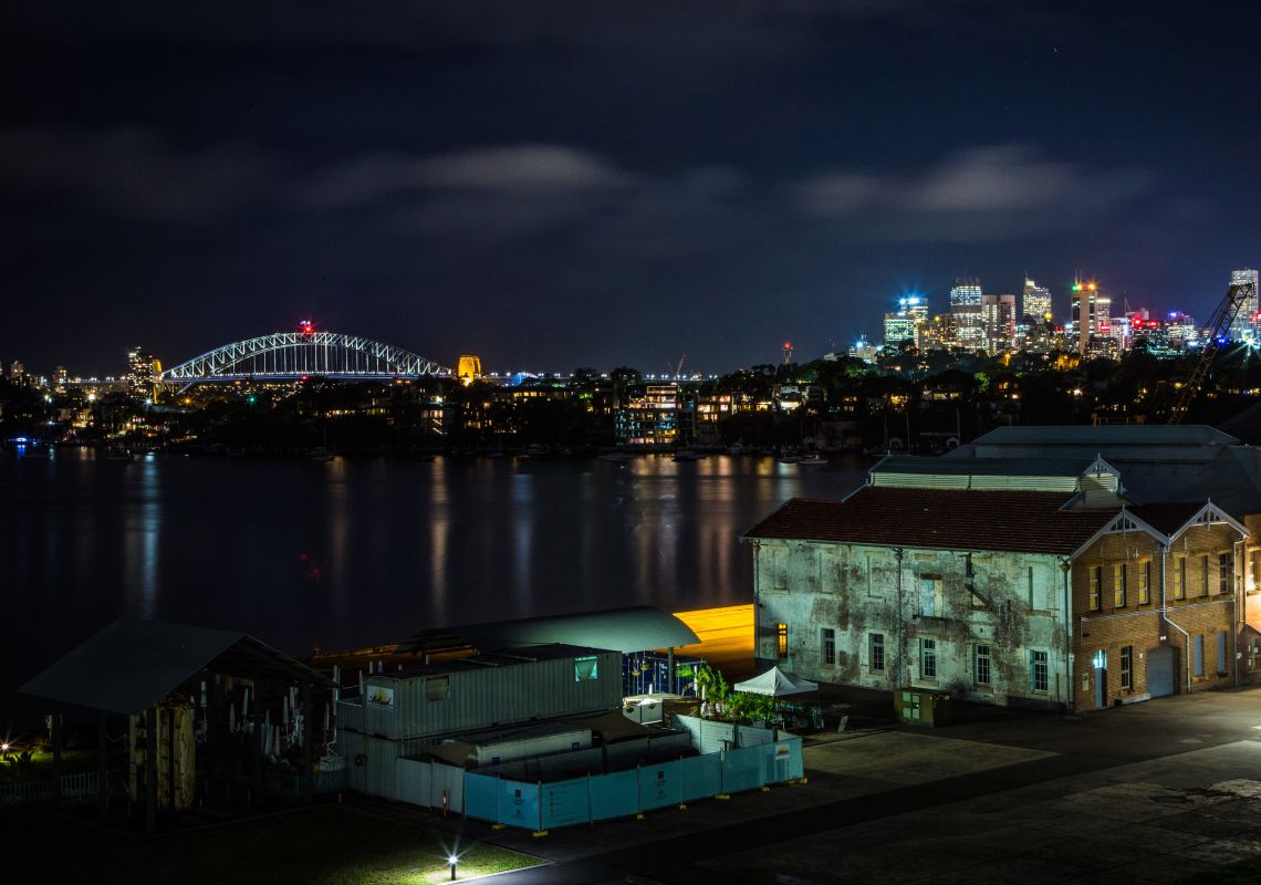 View of the Sydney skyline at night as seen from Cockatoo Island in Sydney Harbour, Sydney City