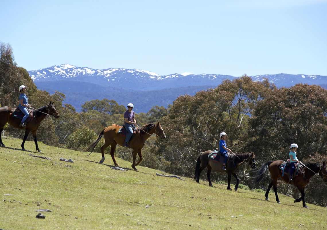 Family enjoying a scenic horse ride around the Snowy Wilderness property in Ingebirah, Snowy Mountains.