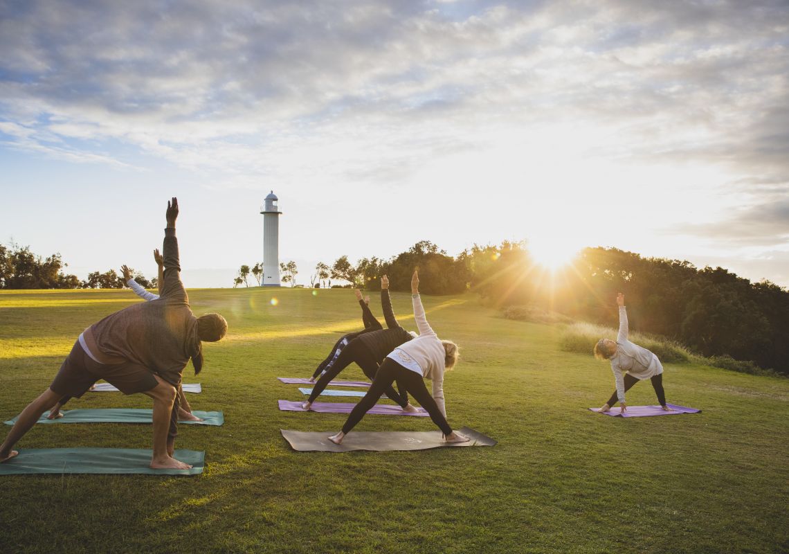 People enjoying a Yoga Room class in Wooli Park, Yamba, Clarence Valley 