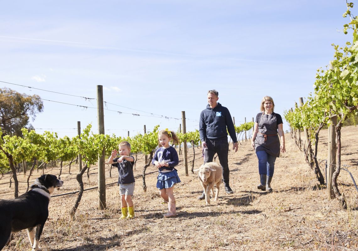 Sarah McDougall owner and operator of the Lake George Winery with her family