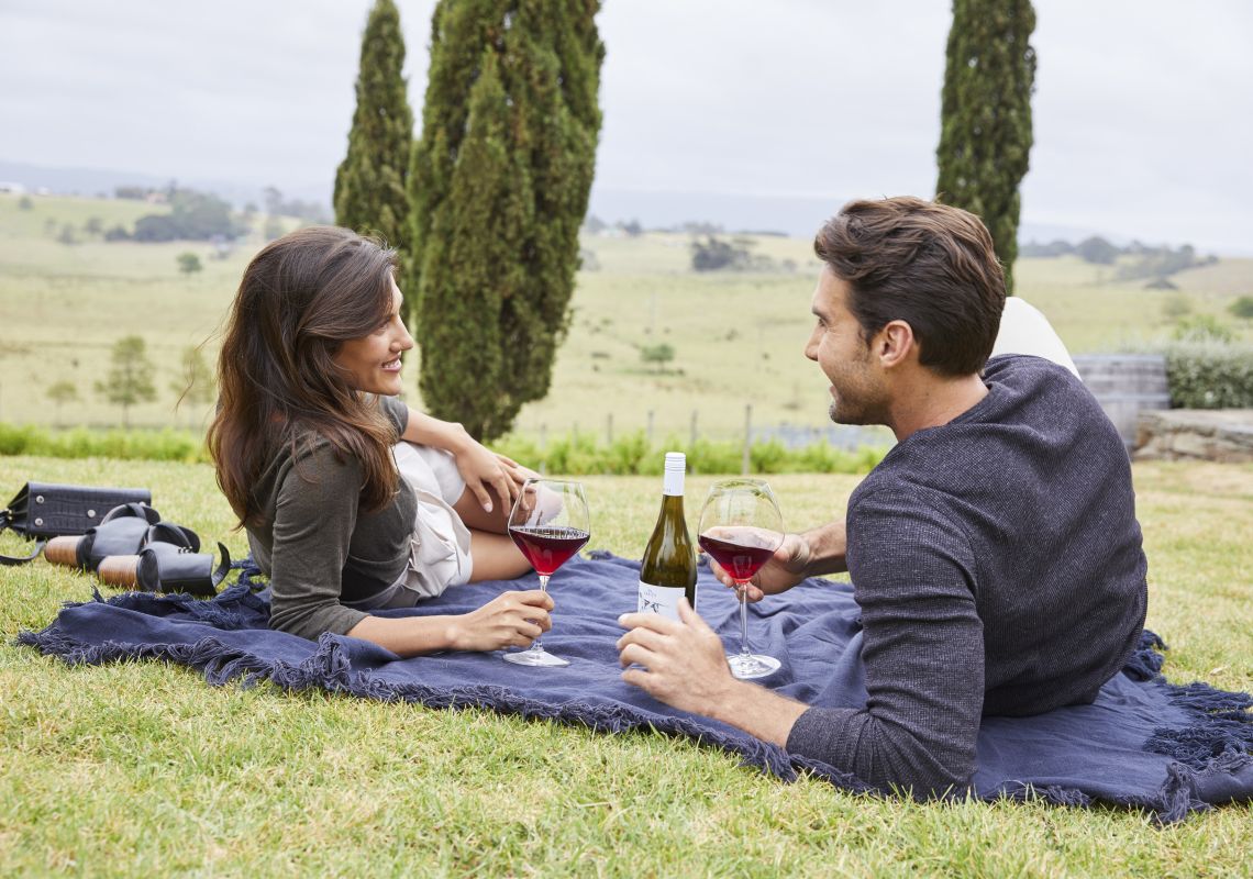 Couple picnicing in Cupitt's Winery in Ulladulla - Shoalhaven
