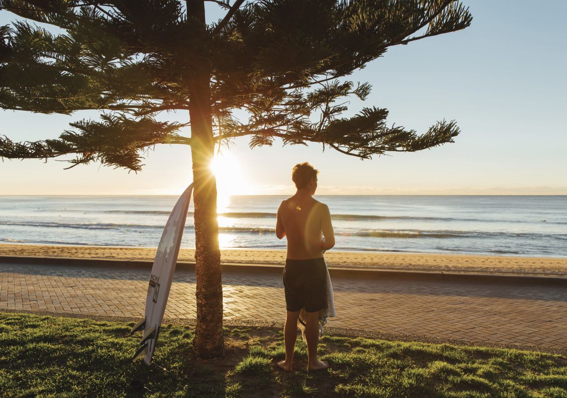Manly Beach - Surfer watching the sunrise 