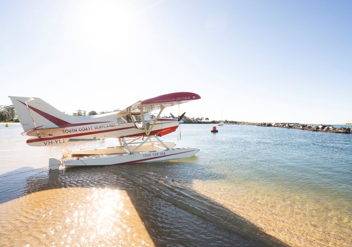 South Coast Seaplane aircraft docked on the banks of Moruya Lake, Moruya, Batemans bay Area