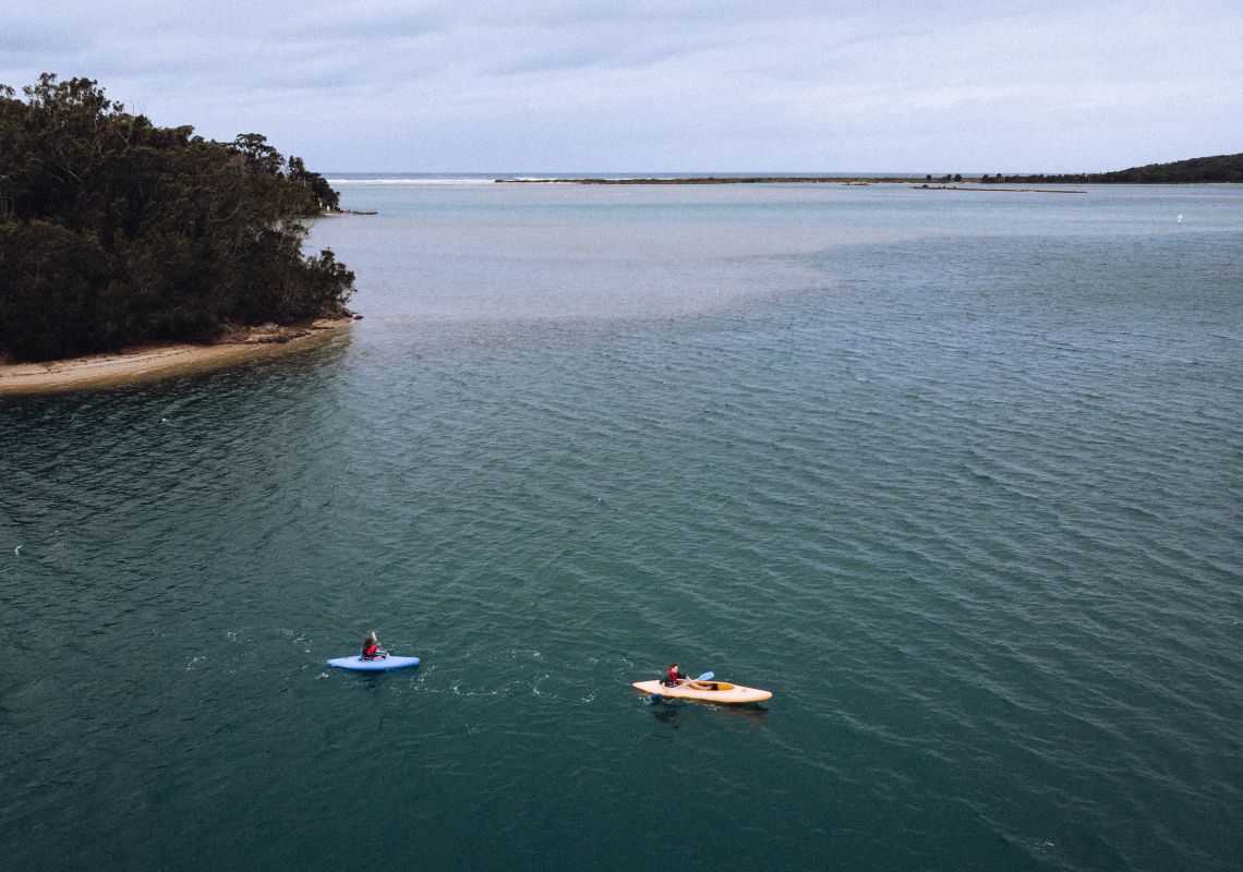 Couple kayaking along Tuross Lake, Tuross Head, Batemans Bay