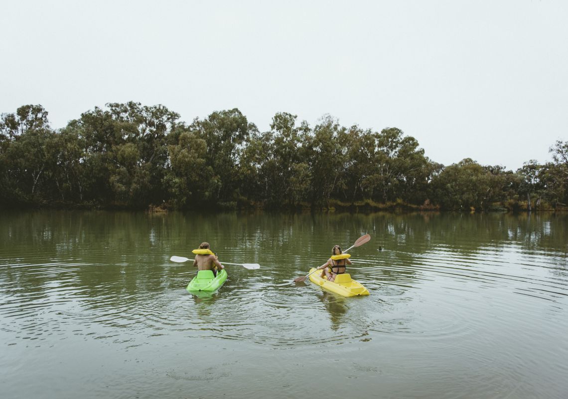 Couple enjoying a morning kayak on the Murray River, Wentworth, The Murray, Country NSW