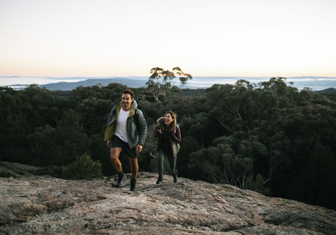 Couple enjoying a scenic walk through Woomargama National Park, Wantagong, The Murray