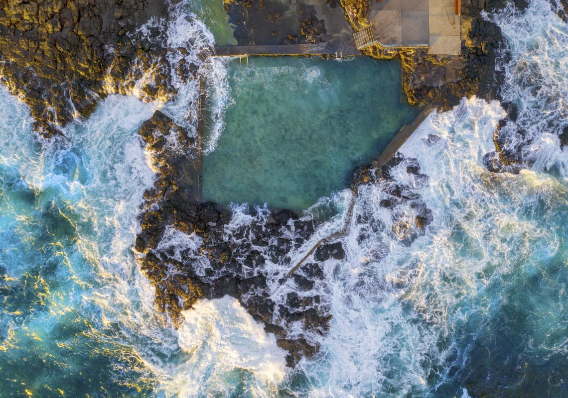 Aerial overlooking Blowhole Point Rock Pool in Kiama, South Coast