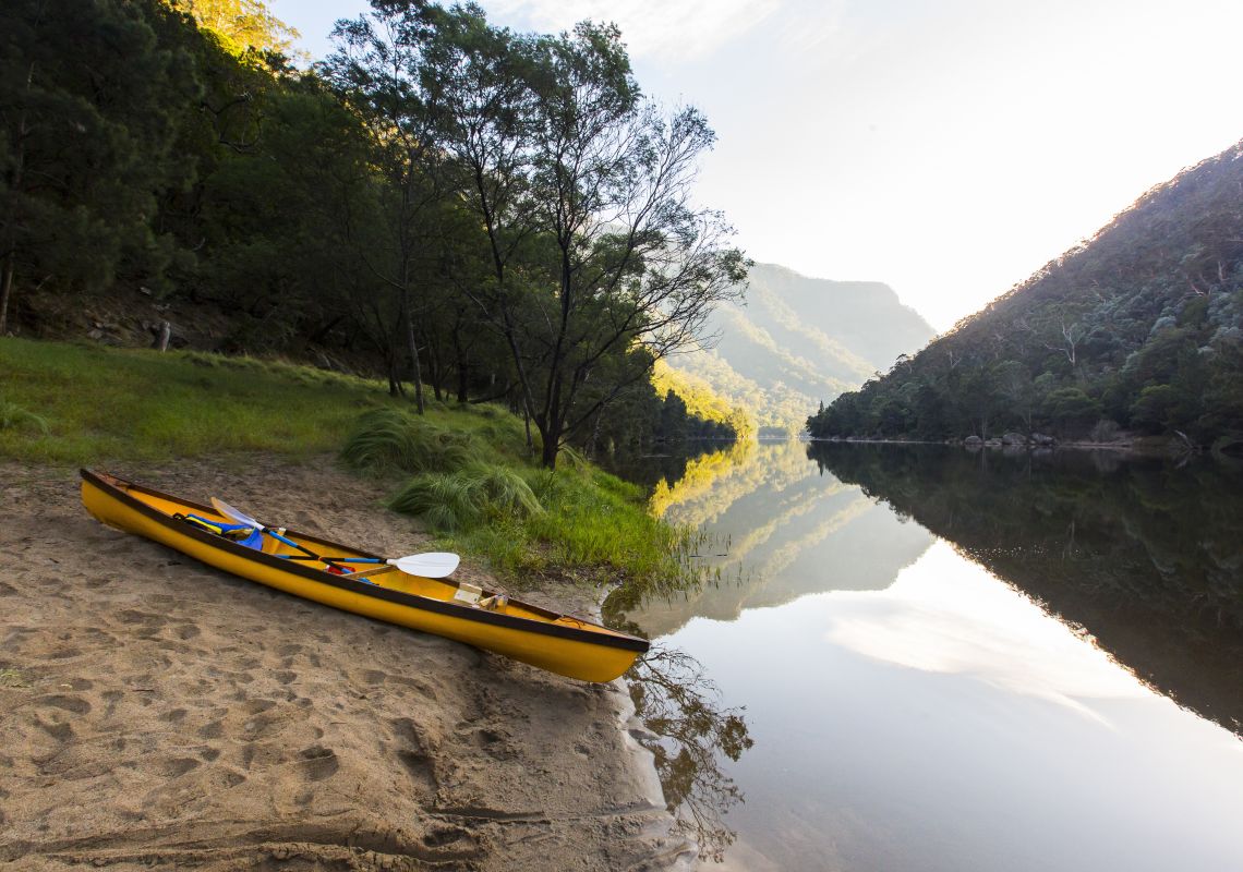 Canoe on a bank of the Shoalhaven River, upstream of the Tallowa Dam in Tallong, Jervis Bay and Shoalhaven