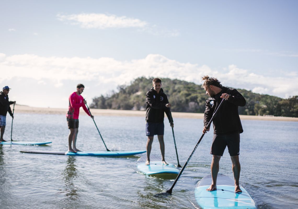 The Wajaana Yaam Adventure Tours stand up paddleboarding experience on the Corindi River, Red Roc, North Coast
