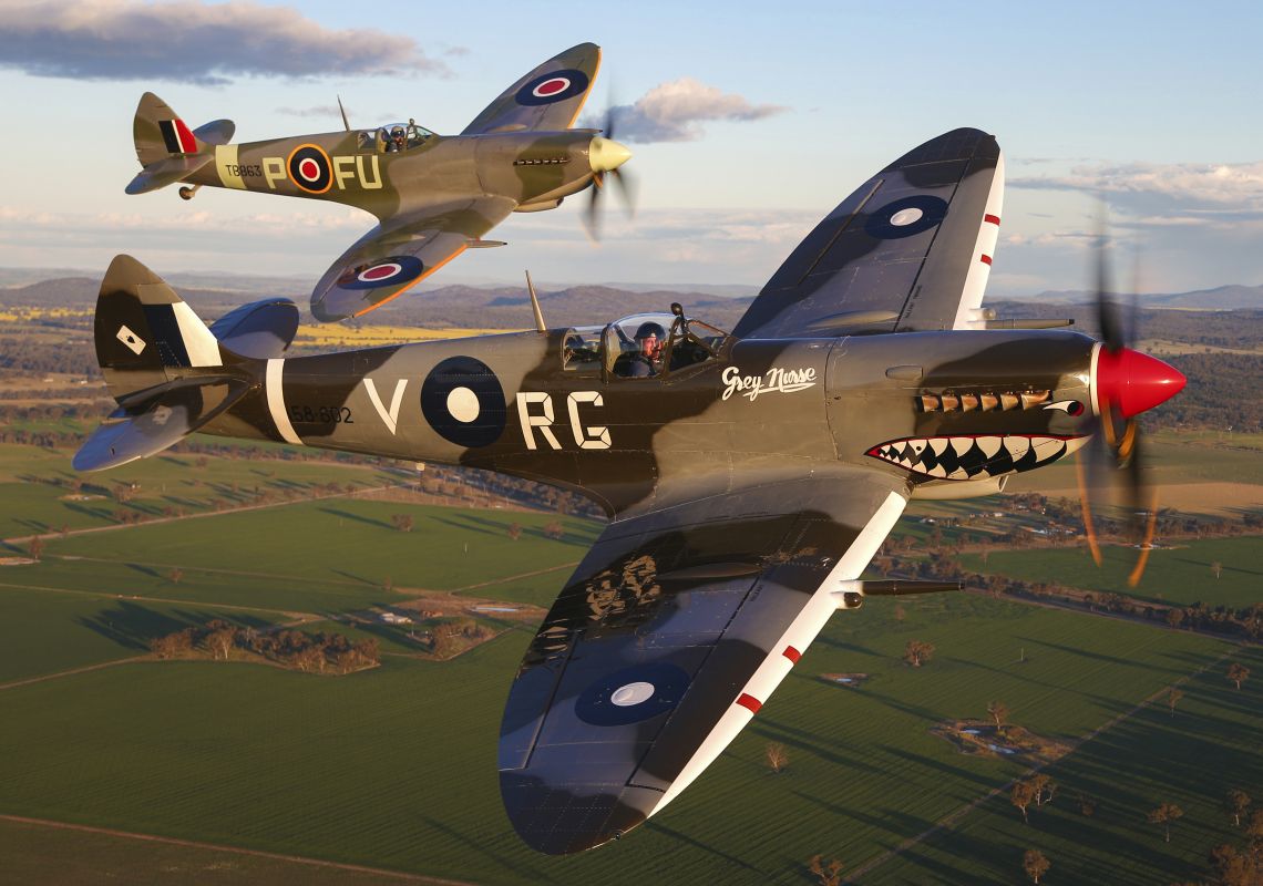 The Temora Aviation Museum's MK VIII Spitfire (front) and MK XVI Spitfire (back) flying in formation over Temora in the Riverina
