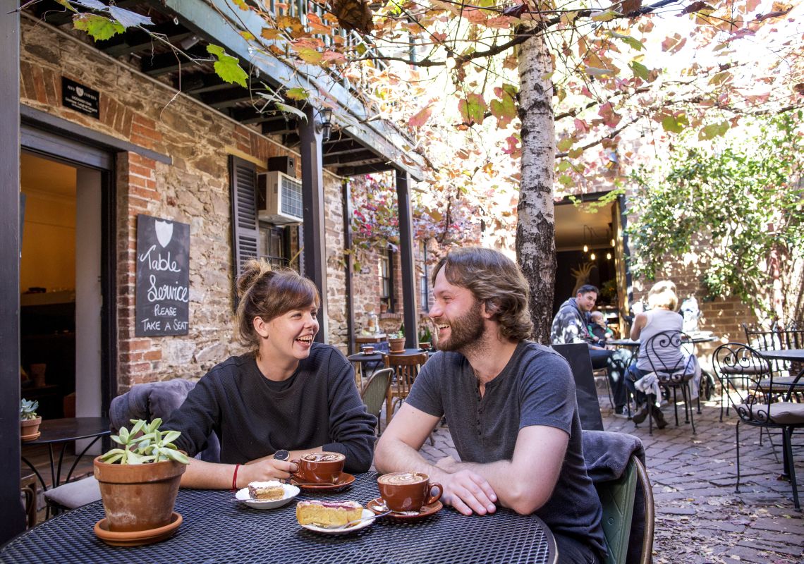 Couple enjoying a relaxing breakfast in Alby + Esters in Mudgee, Country NSW